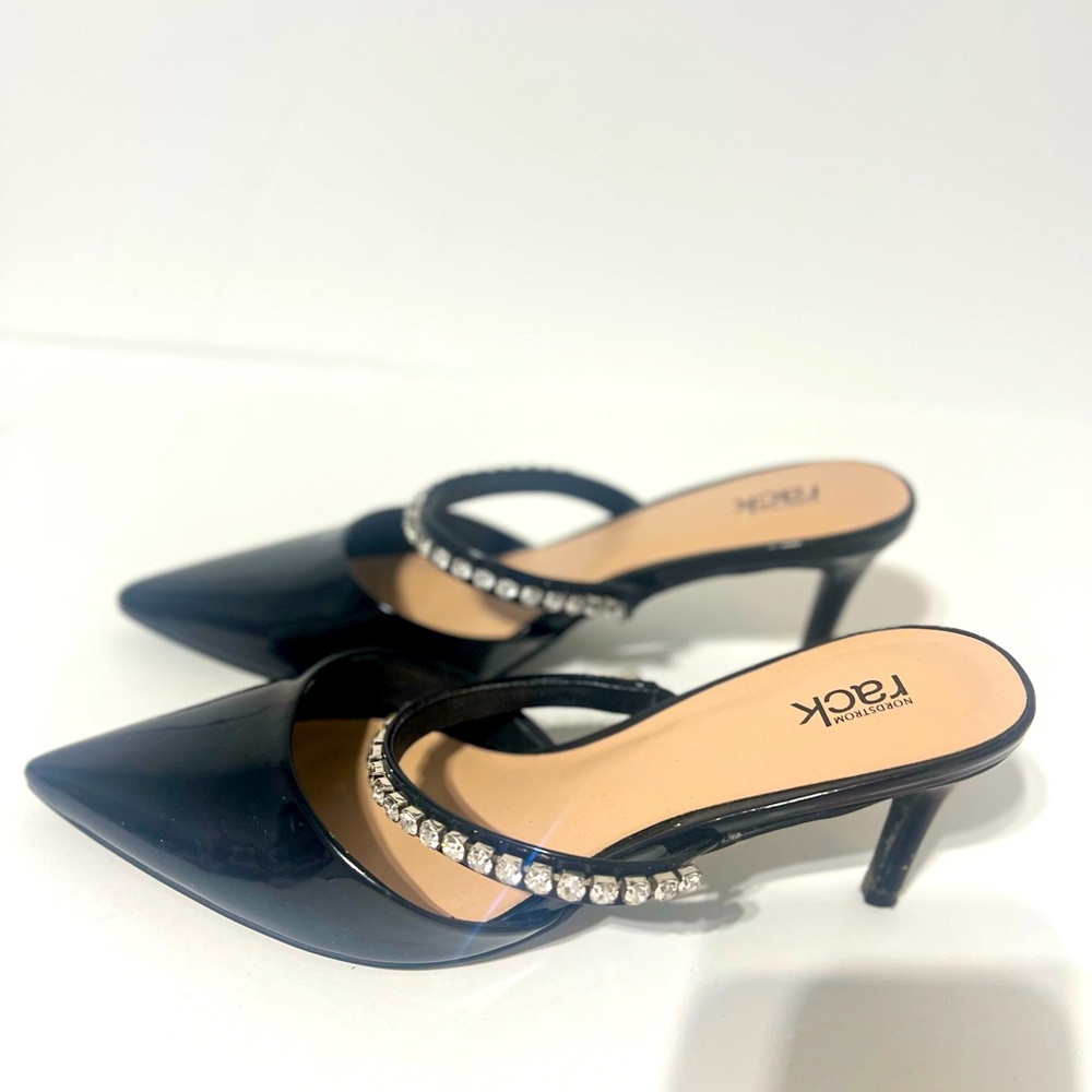 Elegant Black Heels with Rhinestone Detail
3 inches
